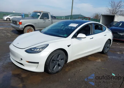 2021 Tesla Model 3 Standard Range Plus Rear-Wheel Drive from USA, damaged, VIN 5YJ3E1EA5MF850574